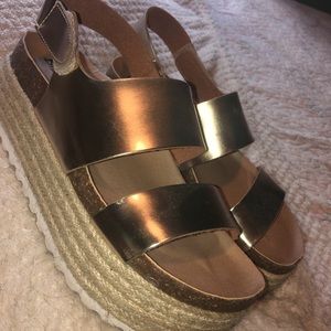 Gold platform shoes